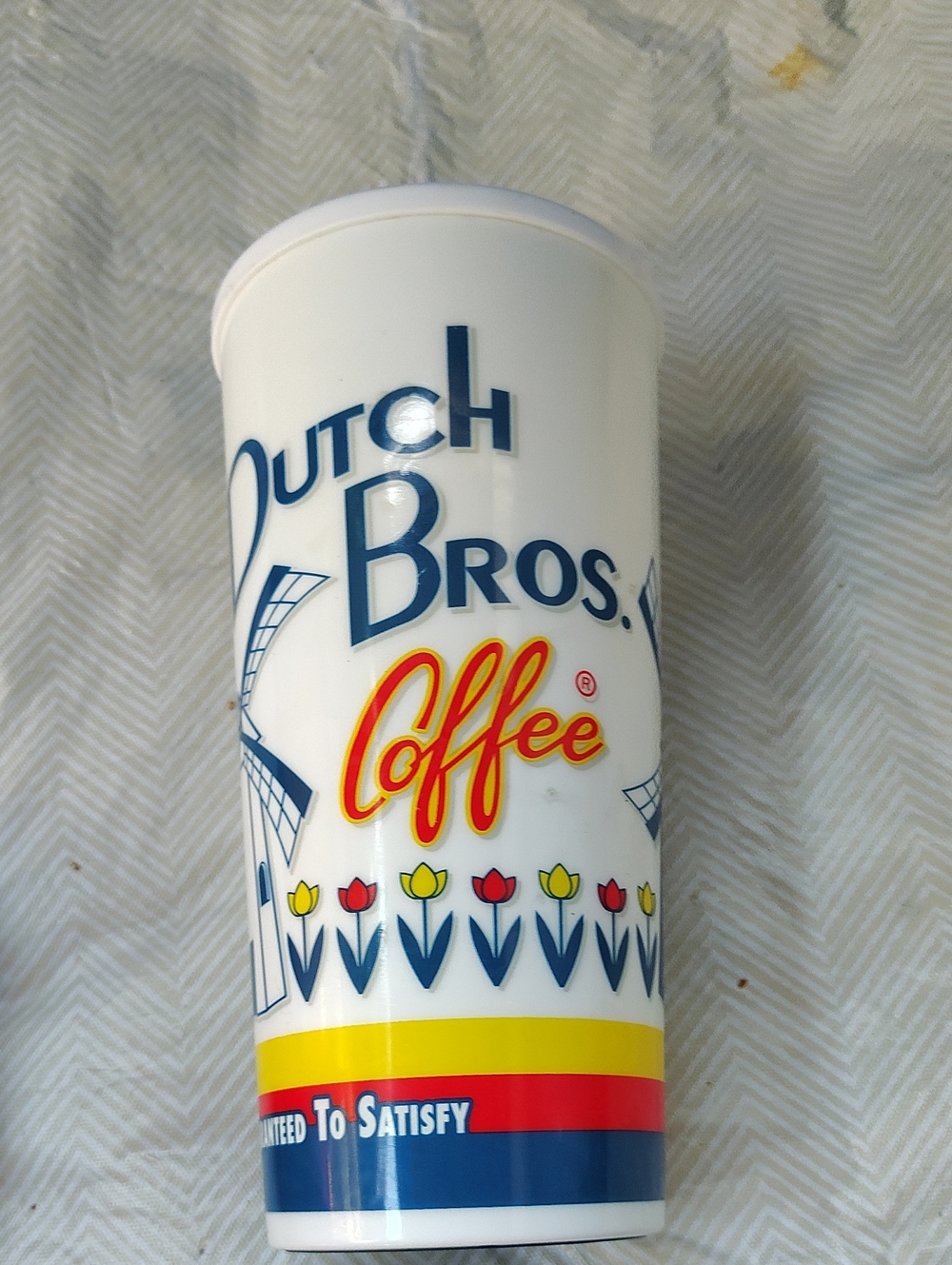Dutch Bros White Travel Cup with Blue, Yellow & Red Accents